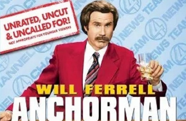 Will Ferrell as Ron Burgundy in Anchorman sitting at a deck with a suit jacket, shirt and tie on, but no pants