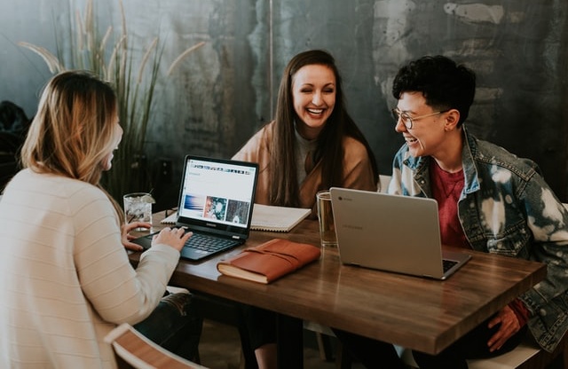 People in a meeting at a table